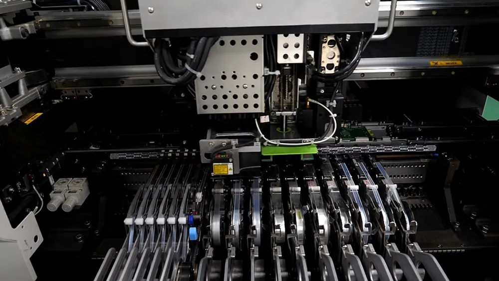 Automated PCB Assembly machine in action